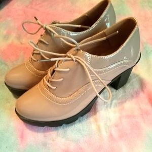 Beige... taupe... colored small Michael Jackson shoes.Size 7.5 Wide